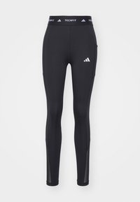 STASH - Leggings - Trousers - black