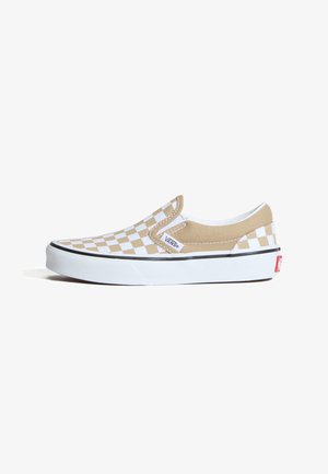 Beżowo-białe wsuwane sneakersy Vans w kratę z białą podeszwą i czarną lamówką, pokazane z boku na białym tle.