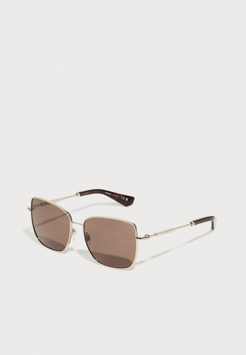 Braune rechteckige Sonnenbrille mit goldfarbigem Metallrahmen, kontrastierenden dunkelbraunen Bügelenden und klaren Hardwareakzenten.