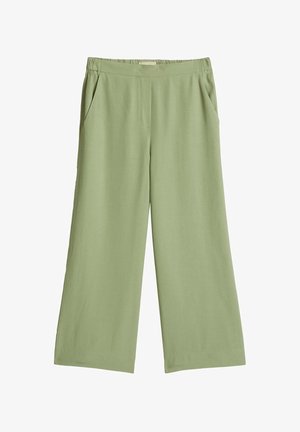 Pantalon large vert clair avec taille élastique et poches latérales, fabriqué en tissu doux et fluide.