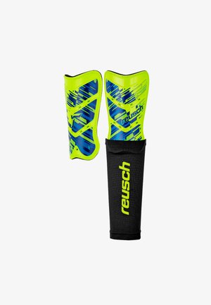Reusch shin guards featuring a bright yellow-green design with blue patterns and textures, and a black fabric sleeve for secure fit.