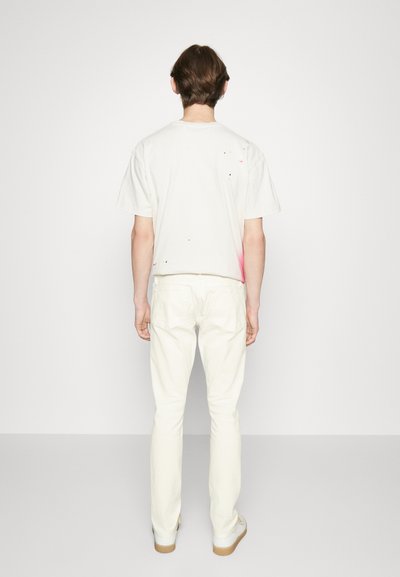 FRAME HOMME - Karcsúsított farmerek - whisper white