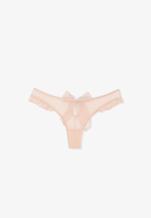 Durchsichtiger rosa Tanga mit Tupfenmuster, gerafften Kanten und einer kleinen Schleife auf der Rückseite, gestaltet in einer minimalistischen Form.