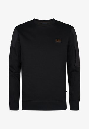 Hanorac negru din material texturat, cu gât rotund, manșete ribbate și o etichetă cu logo pe piept. Buzunar lateral cu detaliu cu fermoar.