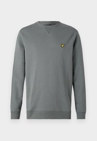 Felpa grigia in misto cotone, con maniche lunghe, collo rotondo e un piccolo logo giallo ricamato sul petto.