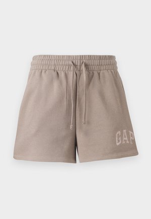Beige shorts laget av mykt materiale, med elastisk midje og snor, samt brodert "GAP"-logo nederst foran.