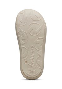 Semelle en caoutchouc beige clair avec un motif de logo circulaire, une texture antidérapante et un nom de marque en relief "Naturino". Idéal pour des chaussures décontractées.