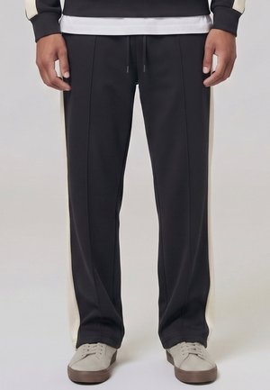 Urban Classics, PIQUÉ OPEN LEG TRACKPANTS - Pantalon de survêtement - black