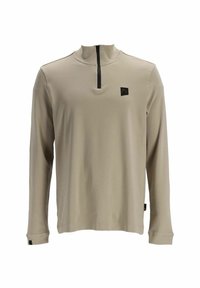 Beige Langarmhemd mit einem halben Reißverschlusskragen, der einen schwarzen Akzent und ein kleines Logo auf der Brust hat. Glatte Stofftextur.