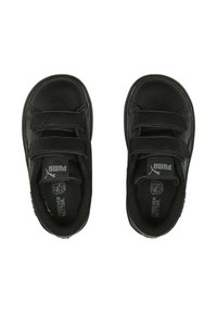 Los zapatos de cuero negro presentan dos correas ajustables de Velcro y una suela texturizada. El forro interior es negro con la marca en las plantillas.