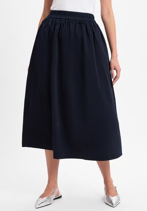 Marineblaue, knöchellange Rock mit elastischem Bund und boxy Form. Hergestellt aus glattem Stoff, verfügt er über Seitentaschen und eine lockere Passform.