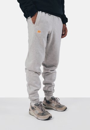 ESSENTIAL - Tracksuit bottoms - grey