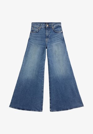 Los jeans de denim azul de pierna ancha presentan un lavado desvaído, cintura alta y un diseño clásico de cinco bolsillos con cierre de botón.