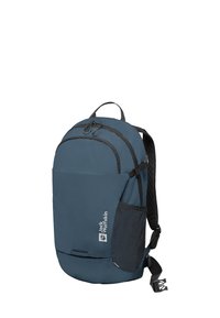 Zaino blu realizzato in materiale sintetico liscio, con spallacci regolabili e una tasca laterale in rete. Presenta un scomparto principale con zip e un dettaglio del logo.