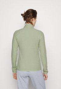 The North Face 100 GLACIER 1/4 ZIP - Camisola de lã polar - tea green