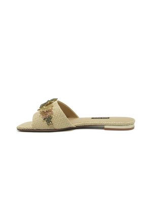 Beige woven slide sandal with flat sole and multicolored floral bead embellishments on the wide front strap.