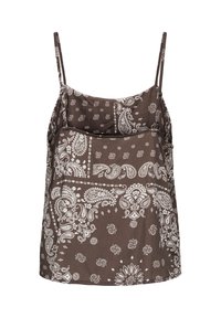 Haut marron sans manches avec motif bandana paisley et floral blanc et fines bretelles sur fond uni.