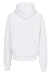 Sweatshirt alb cu glugă, cu o croială lejeră, manșete și tiv bărbierit și textură moale; fără logo-uri sau motive vizibile.