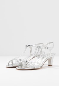 Tamaris Sandaalit nilkkaremmillä - silver-coloured