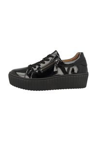 Sneaker en cuir verni noir avec fermeture à lacets et zip latéral. Semelle plate-forme avec texture striée, bout rond et finition lisse.