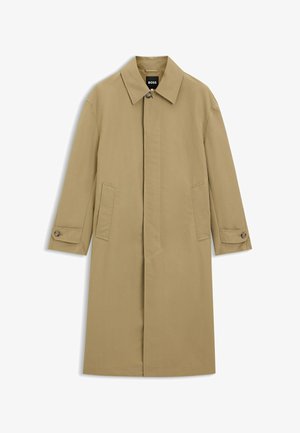 Lange trenchcoat met geknoopte kraag, voorzijde met verborgen knopen, zijzakken en verstelbare, met knopen afsluitbare manchetten.