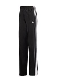 Czarne spodnie sportowe z białymi paskami po bokach, elastyczną talią i kieszenią na zamek. Wykonane z miękkiego, gładkiego materiału. Z logo na biodrze.