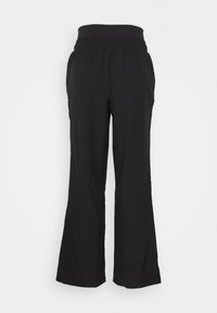 Puma MODEST ACTIVEWEAR WIDE LEG - Treniņtērpa apakšdaļas - black