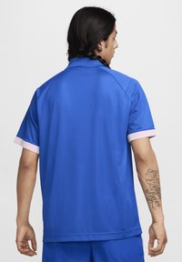 Nike Sportswear AIR - Polo shirt - game royal pink foam hyper pink