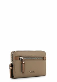 Beige zippered wallet made of smooth textured material, featuring brown accents, a front pocket, and silver hardware with a brand logo.