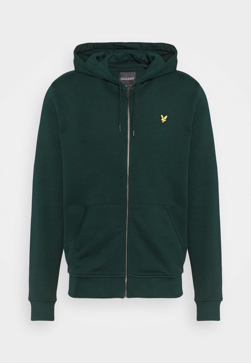 Sweat à capuche zippé vert foncé avec poches avant, capuche à cordon de serrage et petit logo d'oiseau jaune sur le côté gauche de la poitrine.