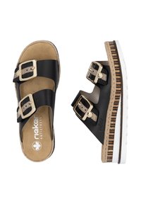 Sandale noire avec deux boucles ajustables, semelle en suédine, intermédiaire en jute tressé et semelle extérieure en caoutchouc blanc. Design plat et ouvert à l'avant.