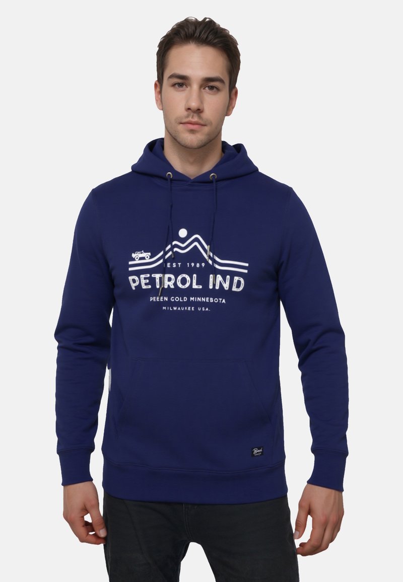 Felpa blu navy con tasca frontale, cappuccio regolabile con cordino e grafica bianca con testo e design di montagne. Tessuto morbido, polsini a coste.