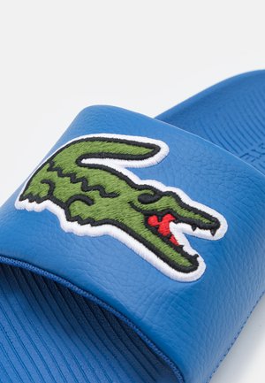 CROCO SLIDE - Mules - blue/green