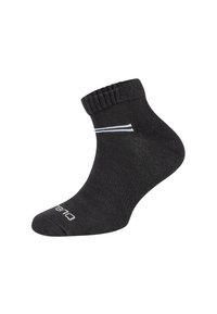 Czarna skarpetka do kostki z dzianiny, z prążkowanym mankietem i dwoma białymi paskami po bokach. Logo nadrukowane na białym tle na dole.