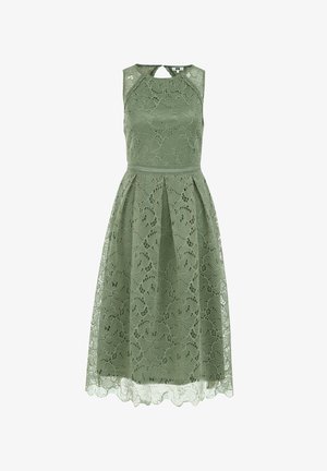 Roheline pitskleit, millel on varrukateta disain, koos avatud kaelusega ja plekitud seelikuga. Tekstuuriga lillemuster kogu kleidis.