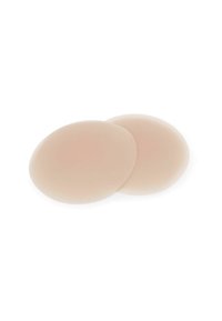 Finti seno in silicone di colore beige naturale, forma ovale, texture liscia e design leggero, ideali per migliorare la forma e il comfort.