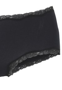 Mutandine in tessuto morbido con bordo in pizzo nero; presentano un orlo a forma di scallop lungo la vita e un corpo liscio.
