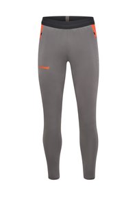 Szare legginsy sportowe o dopasowanym fasonie, czarnym pasie i pomarańczowymi akcentami. Posiadają zasuwane kieszenie po bokach na przechowywanie.