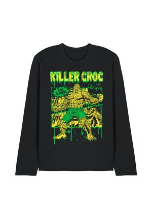 Black long-sleeve shirt with a green and yellow graphic of muscular Killer Croc wearing shorts and "I am beautiful" text.