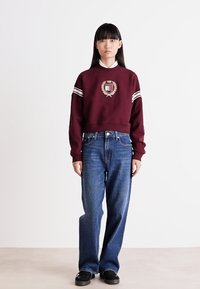 Tommy Jeans Traperice opuštenog kroja - denim dark
