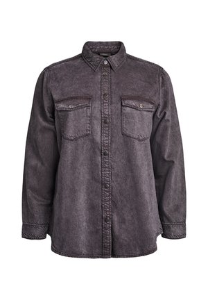 Chemise en jean gris charbon à manches longues avec fermeture boutonnée à l'avant, deux poches poitrine à rabat boutonné et col pointu.