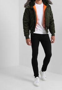Alpha Industries Mezisezónní bunda  - dark green
