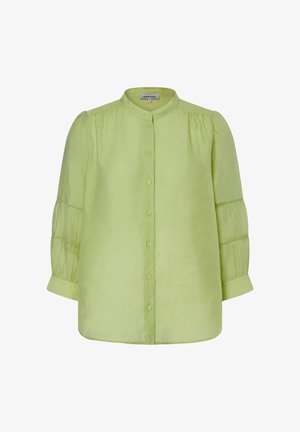 Hellgrüne langärmelige Bluse mit rundem Kragen, durchgehendem Knopfverschluss, aufgeblasenen Ärmeln mit horizontalen Nähten und knopflosen Manschetten.