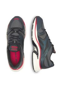 Sportjalatsid, millel on tumedast hallist võrgu ja sünteetilisest materjalist ülemine osa, punaste aktsentidega, pehme valge vaheosa ja tekstureeritud kummist välispind.