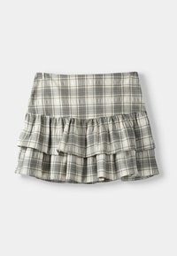 Kostkovaná sukně v černé a krémové barvě, se třemi řasenými vrstvami na lemu, vyrobená z lehké látky. Plochý pas pro lepší střih.