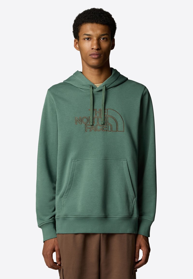 Kapuzensweatshirt aus grünem Stoff mit strukturierter Oberfläche. Verfügt über eine Vordertasche und ein gesticktes Logo in Braun. Lockere Passform mit gerippten Bündchen.