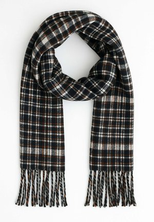 Sciarpa a quadri nera, bianca e arancione con bordi frangiati, realizzata in un tessuto dalla consistenza morbida, con un design ad anello per un facile indossamento.