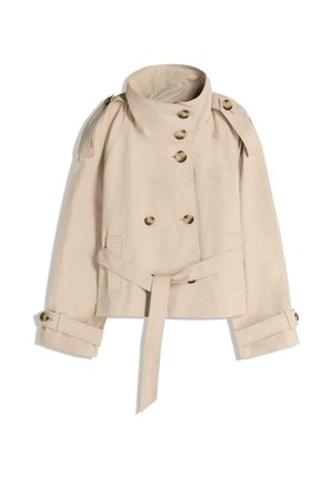 Trench-coat beige en mélange de coton. Comprend un devant croisé à six boutons, une ceinture à la taille et des épaulettes.