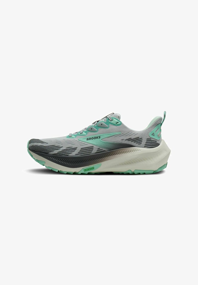 Men's running shoe with a grey mesh upper, green accents, streamlined design, cushioned sole, and textured tread for grip.