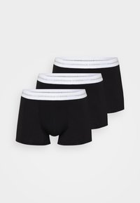 Schwarze Boxershorts in einem Dreierpack, mit einem weißen elastischen Bund, auf dem "Copenhagen Studios" in hellgrau gedruckt ist.